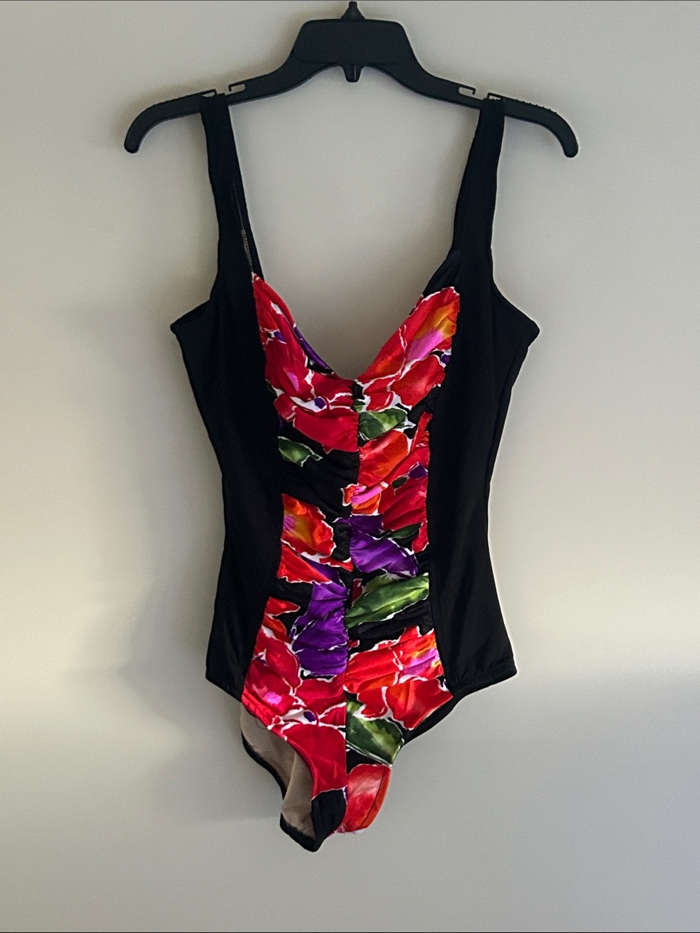 NWOT. Carol Wior Women’s One Piece Swimsuit in a Vibrantly colored design.